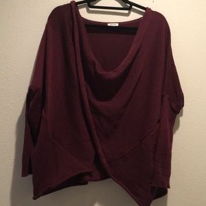 Maroon wrap sweater.